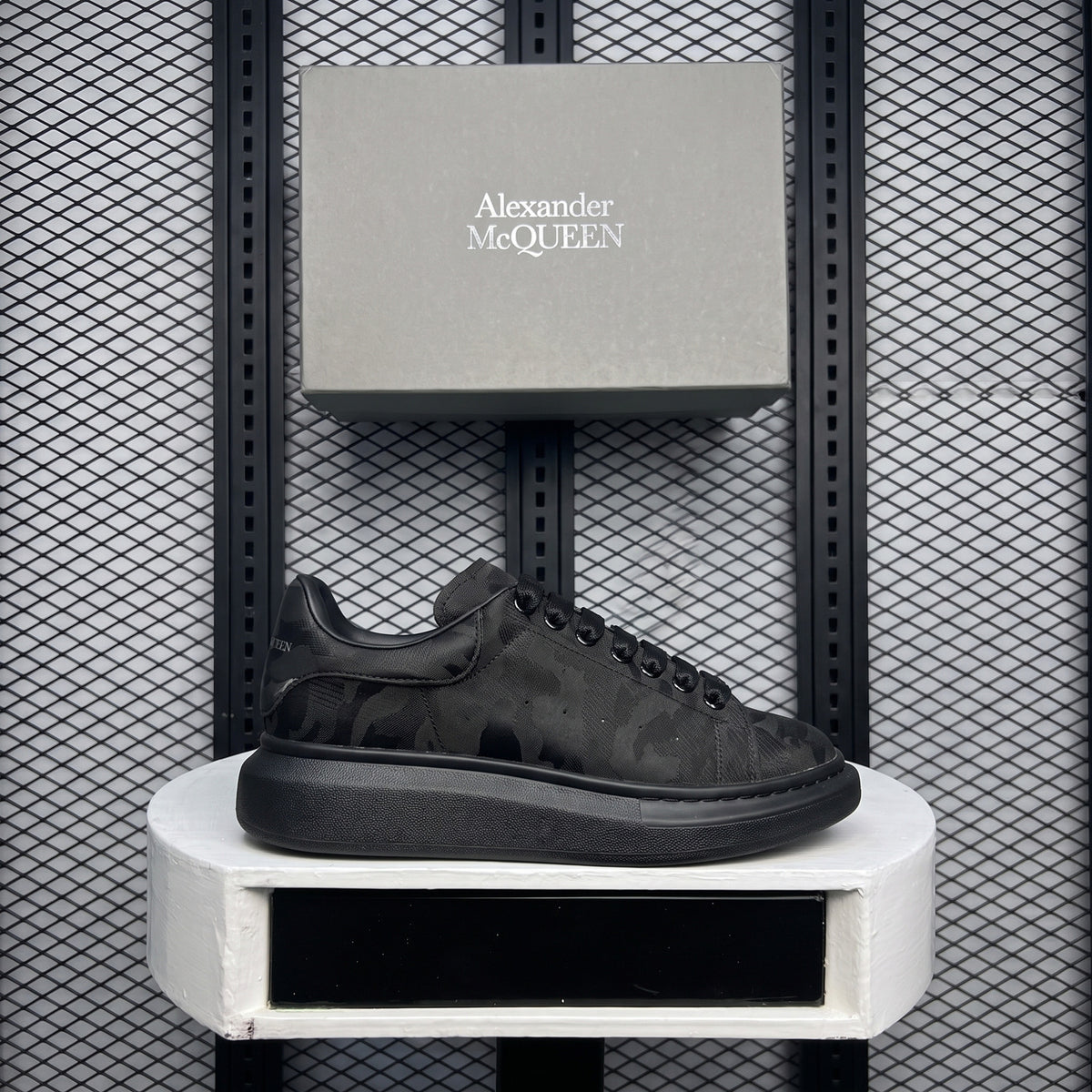 Printed textured canvas low-top in black and charcoal