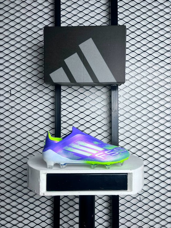 Laceless cleat silhouette in iridescent purple and neon