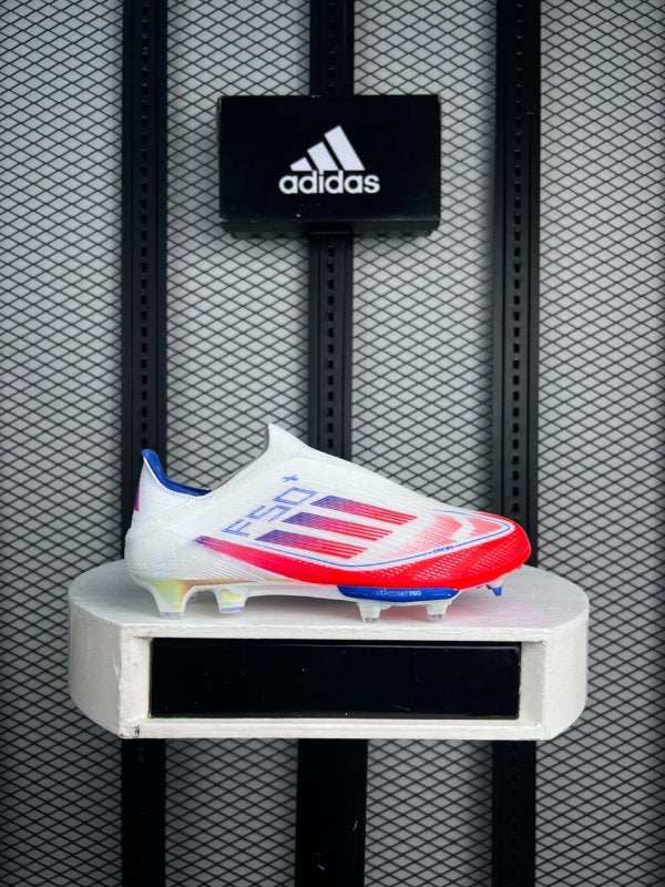 Laceless collar synthetic football boot with red gradient