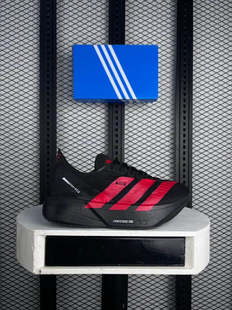 Matte black mesh runner with bright red graphic accents