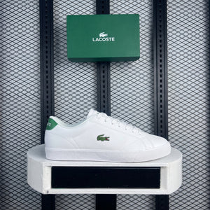 Leather low-top in white and green on a vulcanised sole