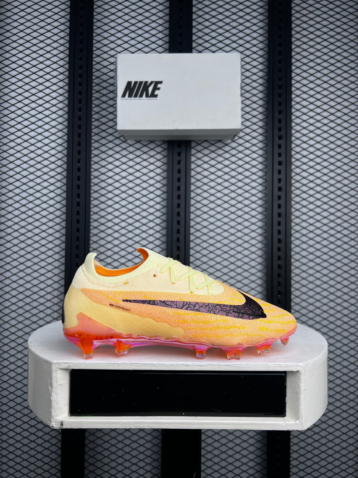 Peach and orange textured knit football boot