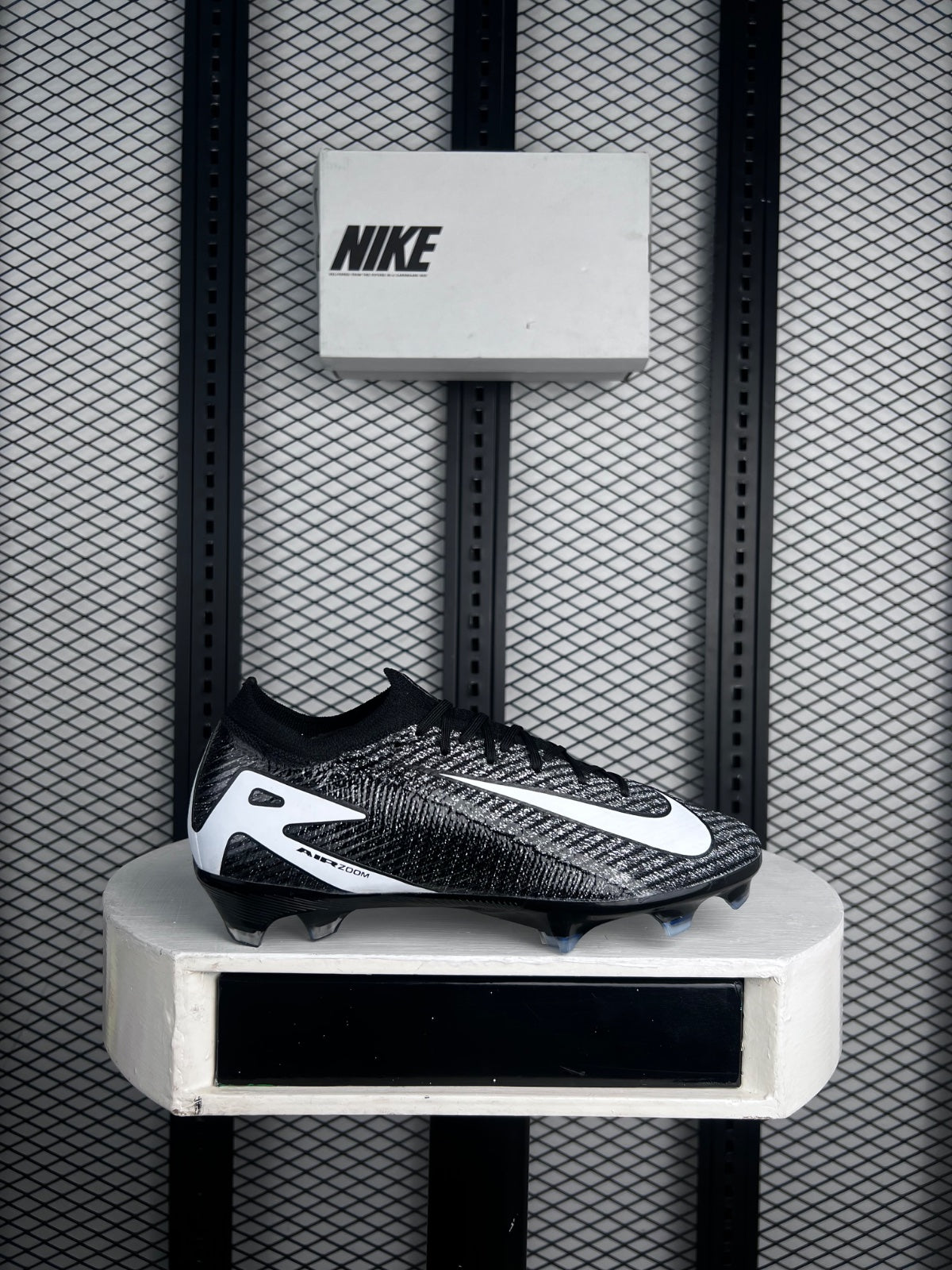 Marled textured football boots with white graphic overlays