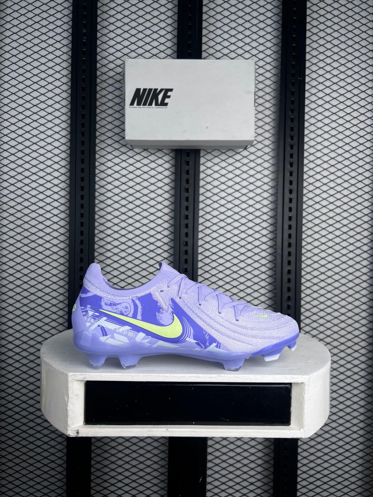 Moulded-texture football boots in lilac and neon yellow