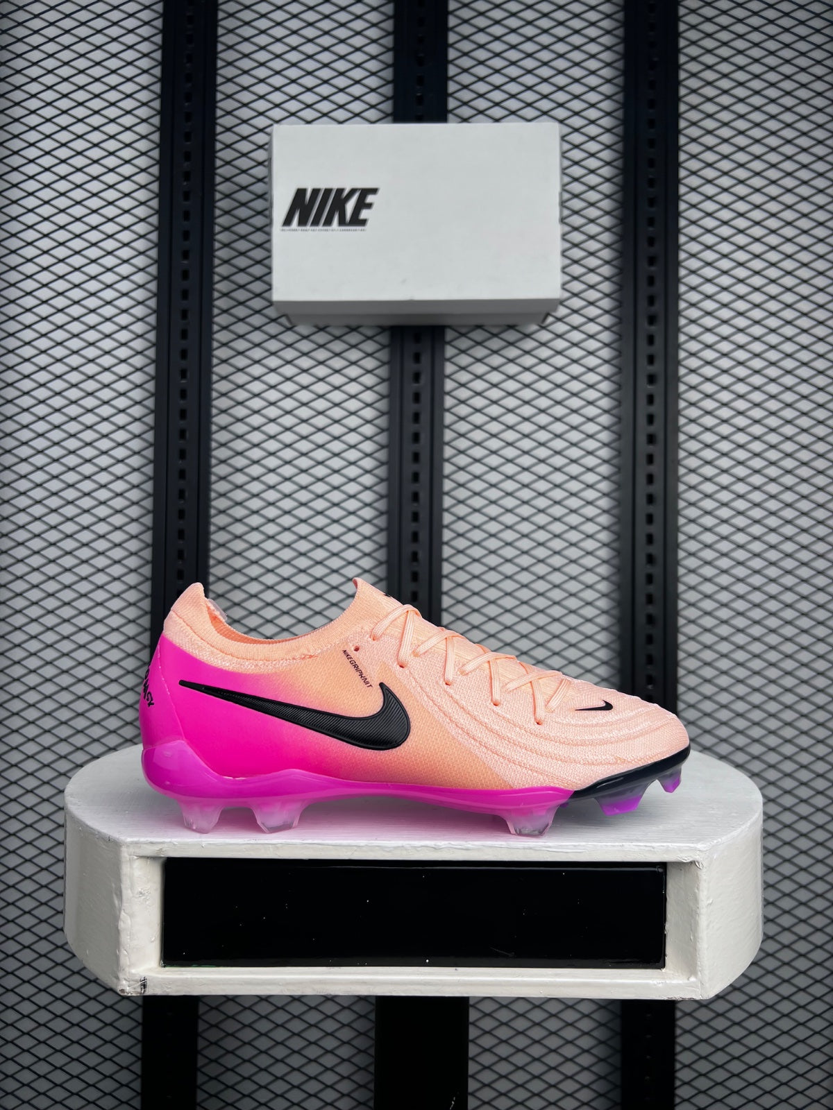 Gradient-finish knit football boots in peach and pink