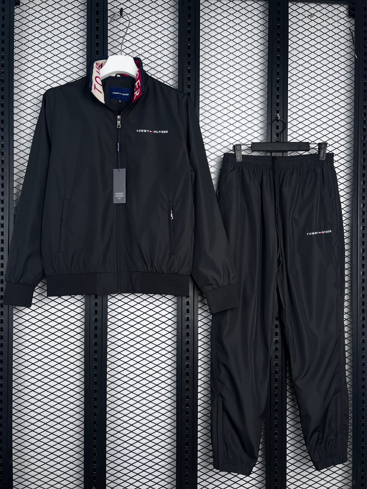 Black  zip-front jacket and black track pants
