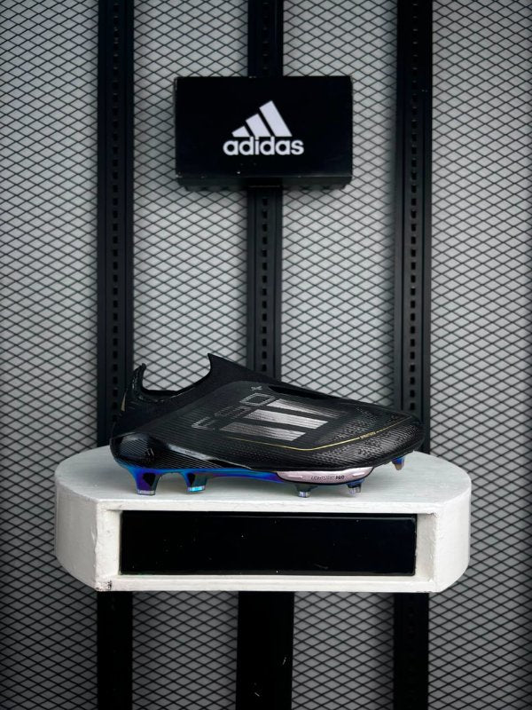 Iridescent-sole laceless football boot in black knit