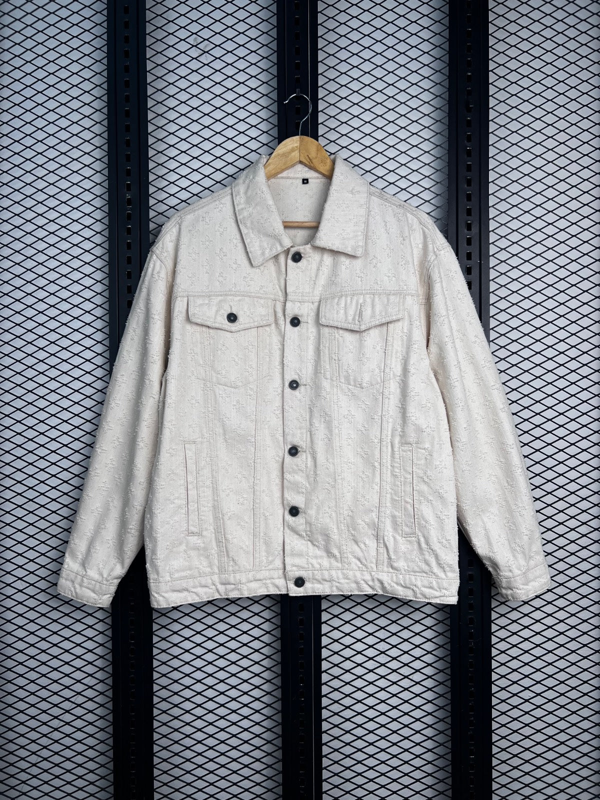 Distressed textured cream denim trucker jacket