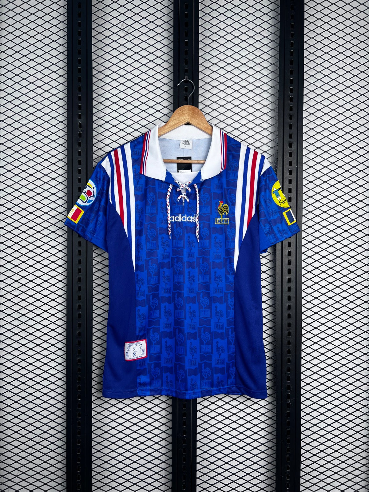 Royal blue retro soccer jersey with lace-up collar
