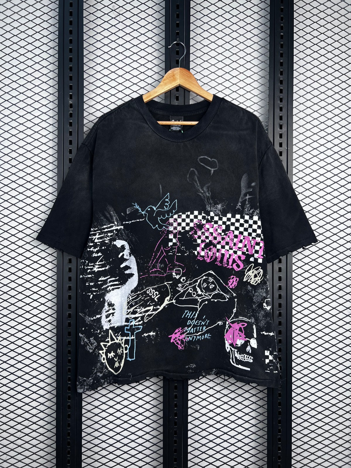 Washed black oversized tee with doodle and checkerboard prints