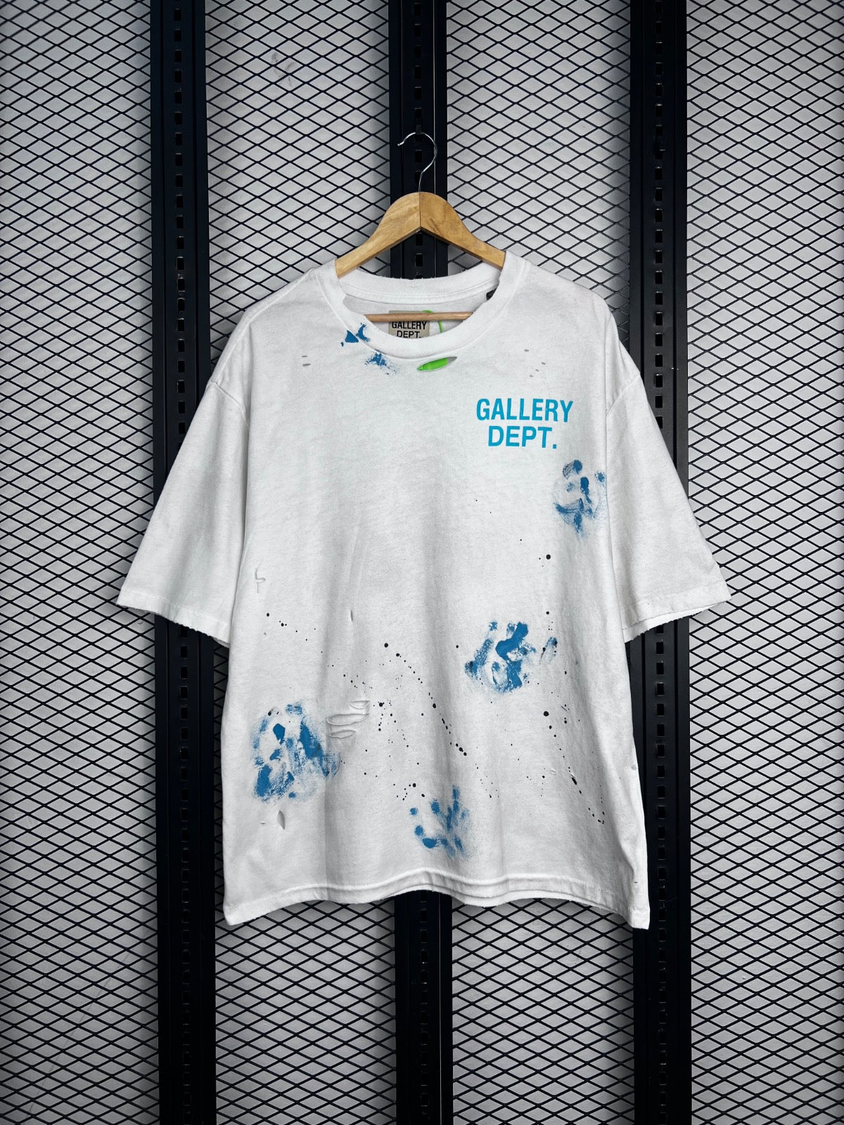 Distressed cotton crewneck tee with blue paint splatter