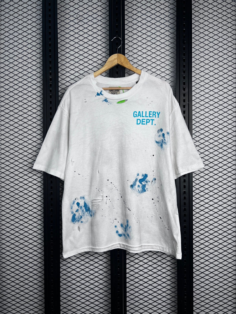 Distressed cotton crewneck tee with blue paint splatter