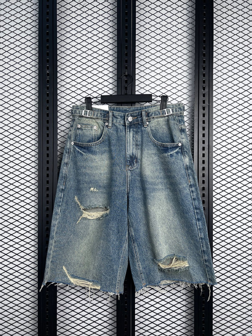 Denim distressed jorts with buckle waist detail