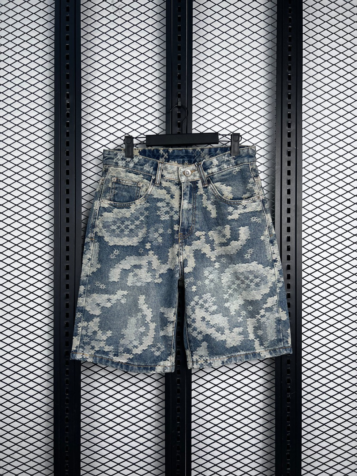 Denim shorts with pixelated jacquard pattern in washed indigo
