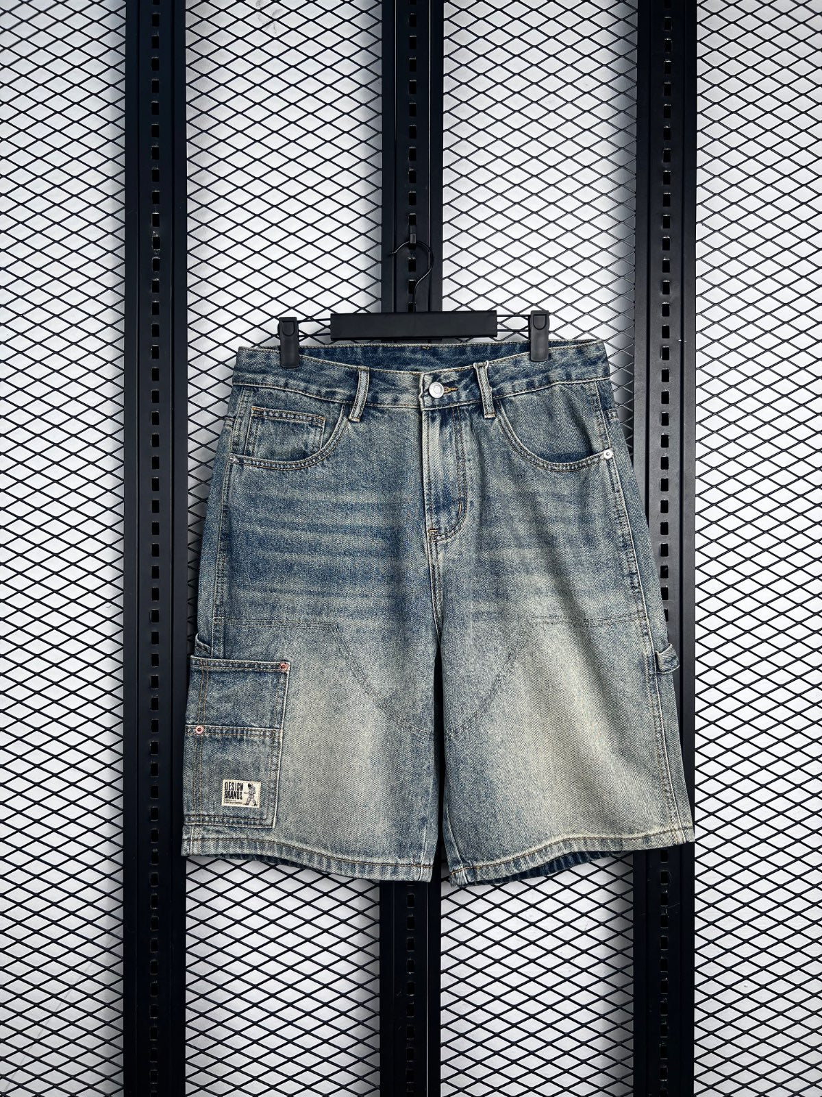 Carpenter pocket acid-wash denim shorts
