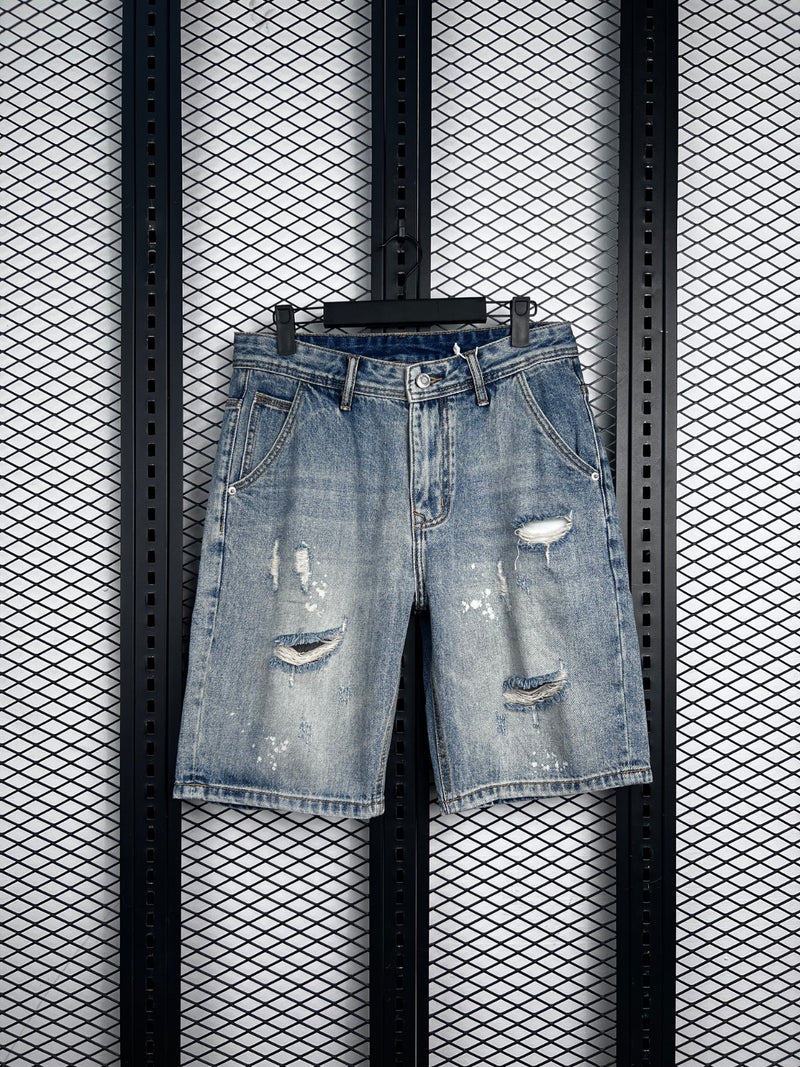 Acid-wash light blue distressed denim shorts