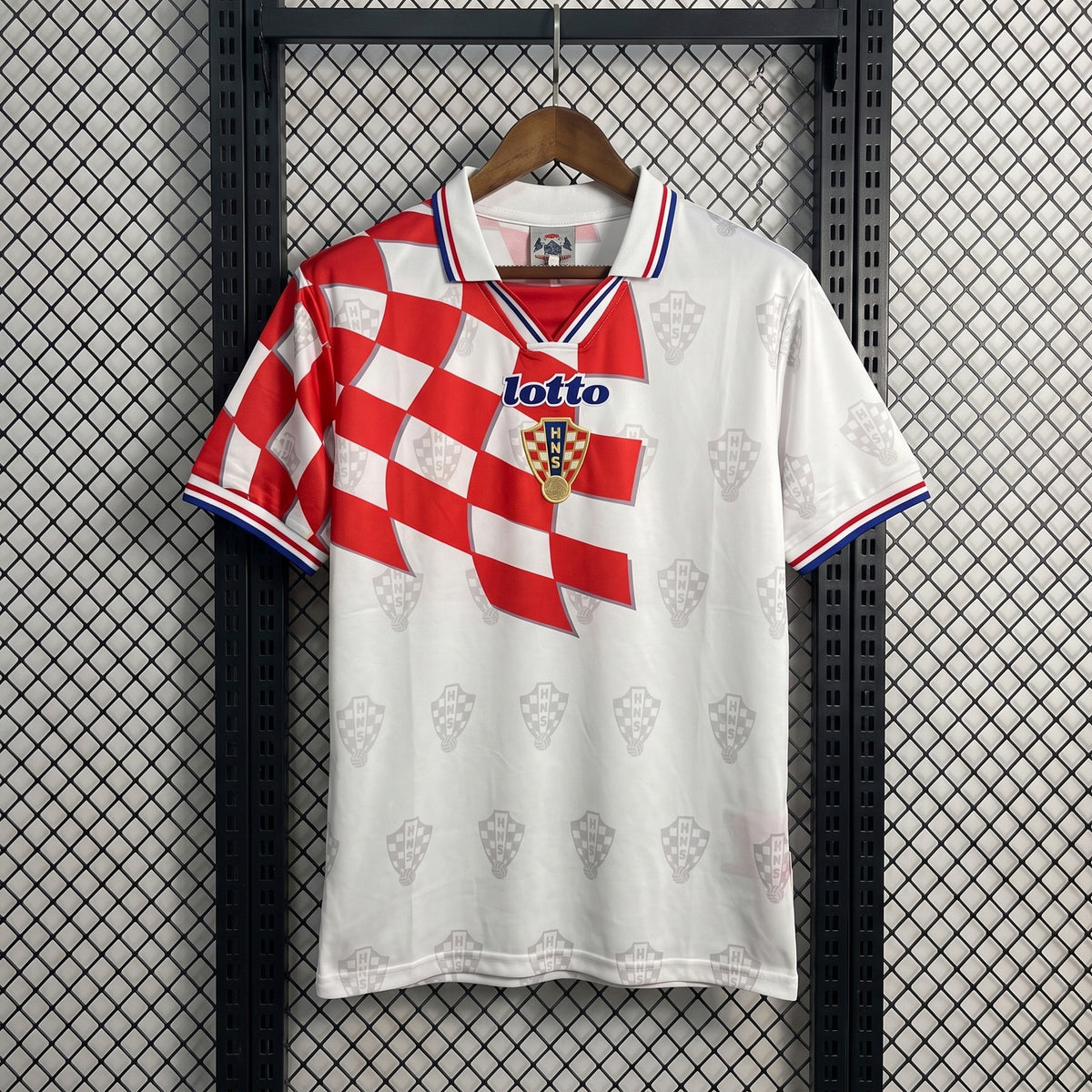Checkerboard drape-panel collared football jersey in white and red