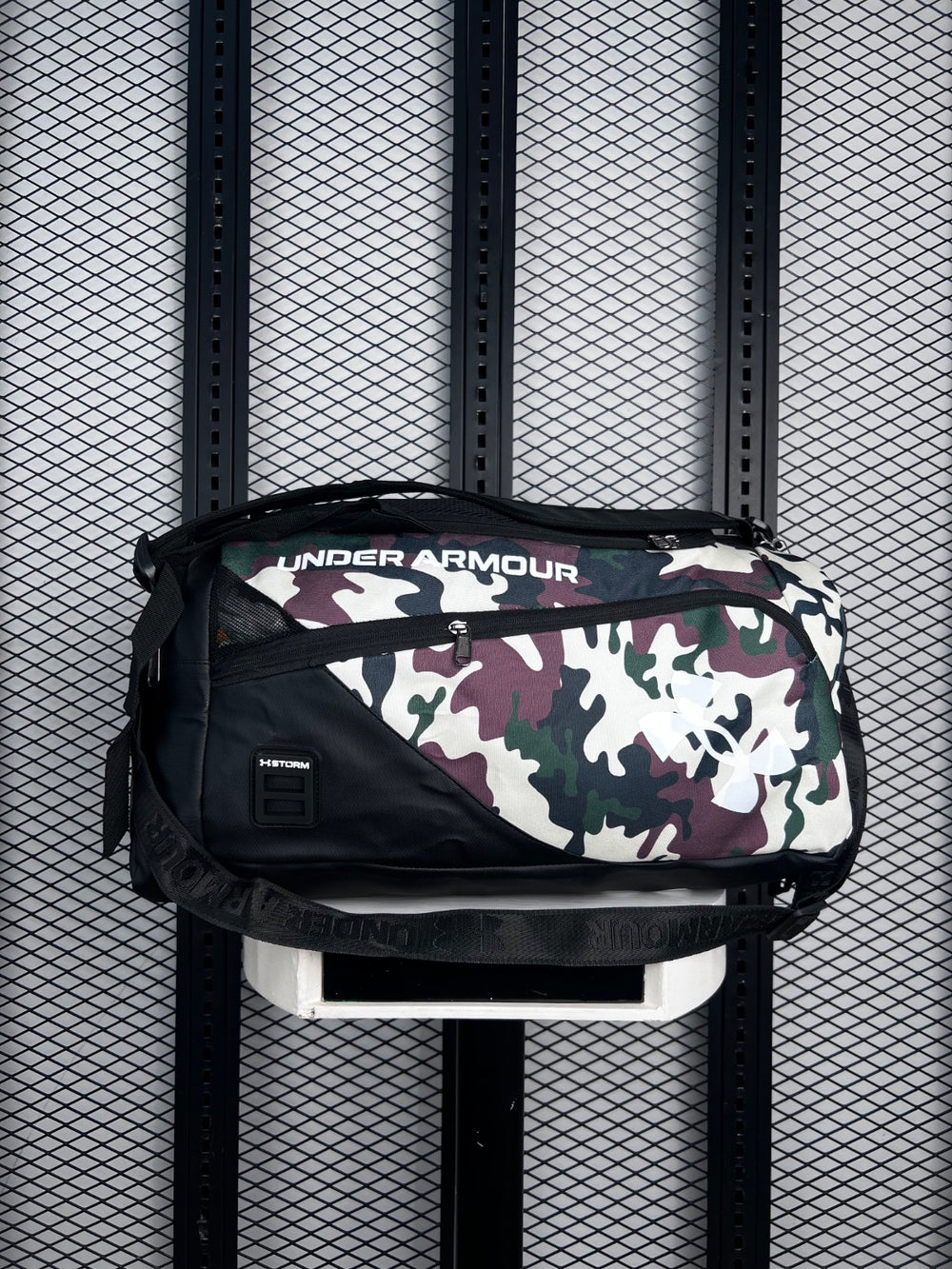 Asymmetric-zip canvas sports bag in woodland camo