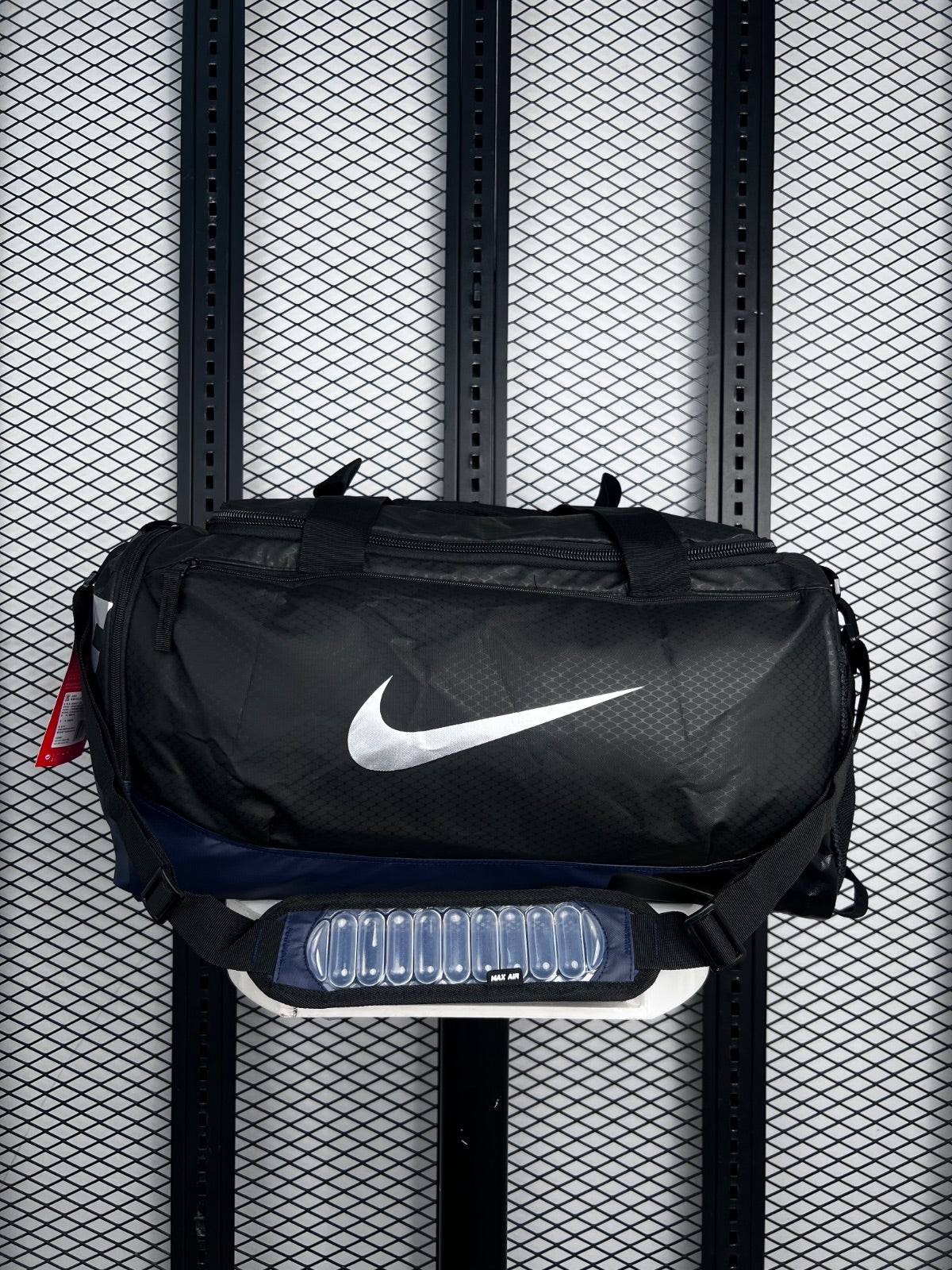 Grid-textured ripstop duffel with navy base panel