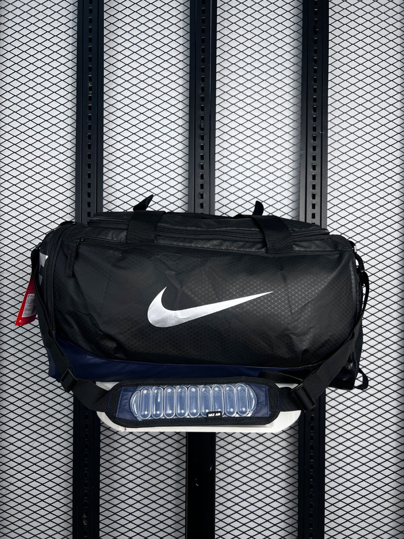Grid-textured ripstop duffel with navy base panel