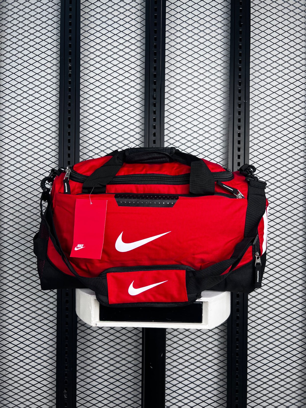 Woven canvas duffel bag in red and black