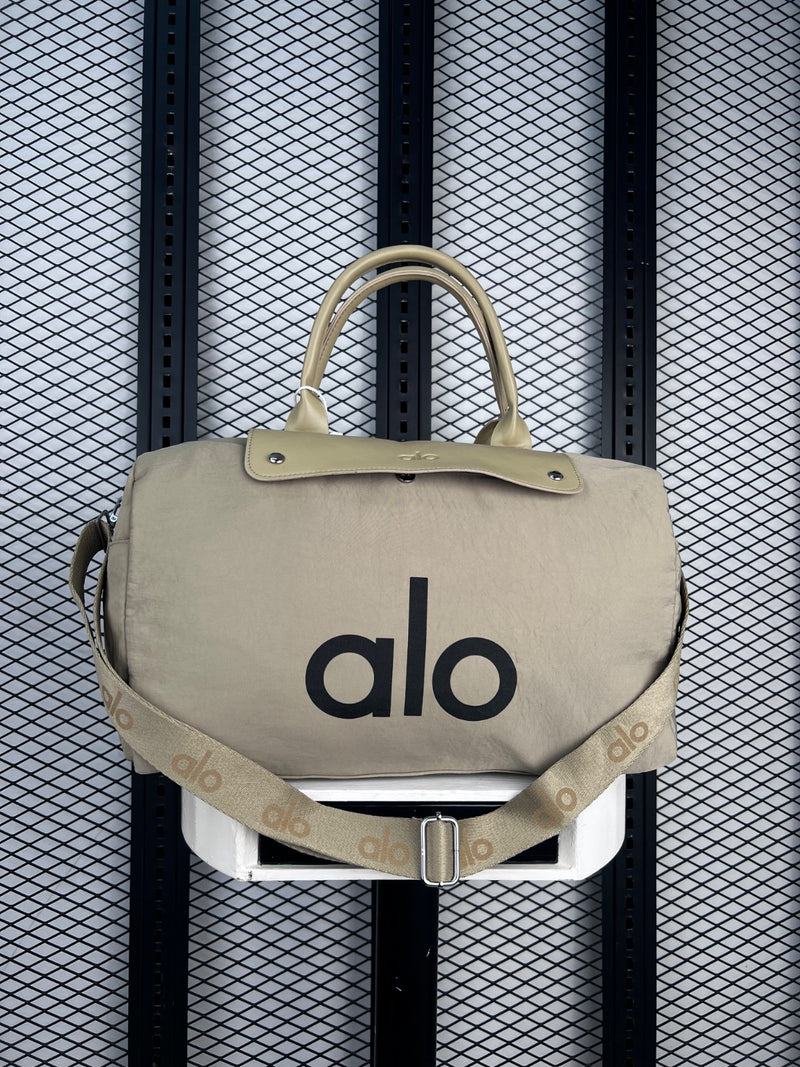 Crinkled nylon duffle with smooth flap closure