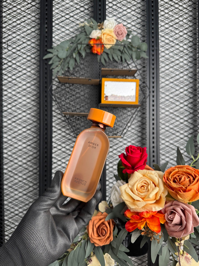 Glass-front boxed fragrance with loose amber stones