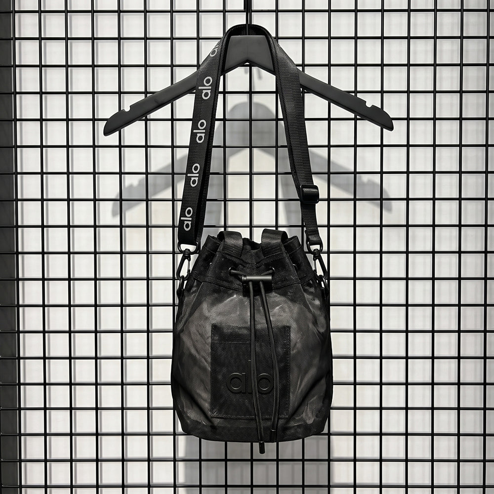 Nylon mesh drawstring bucket bag in black