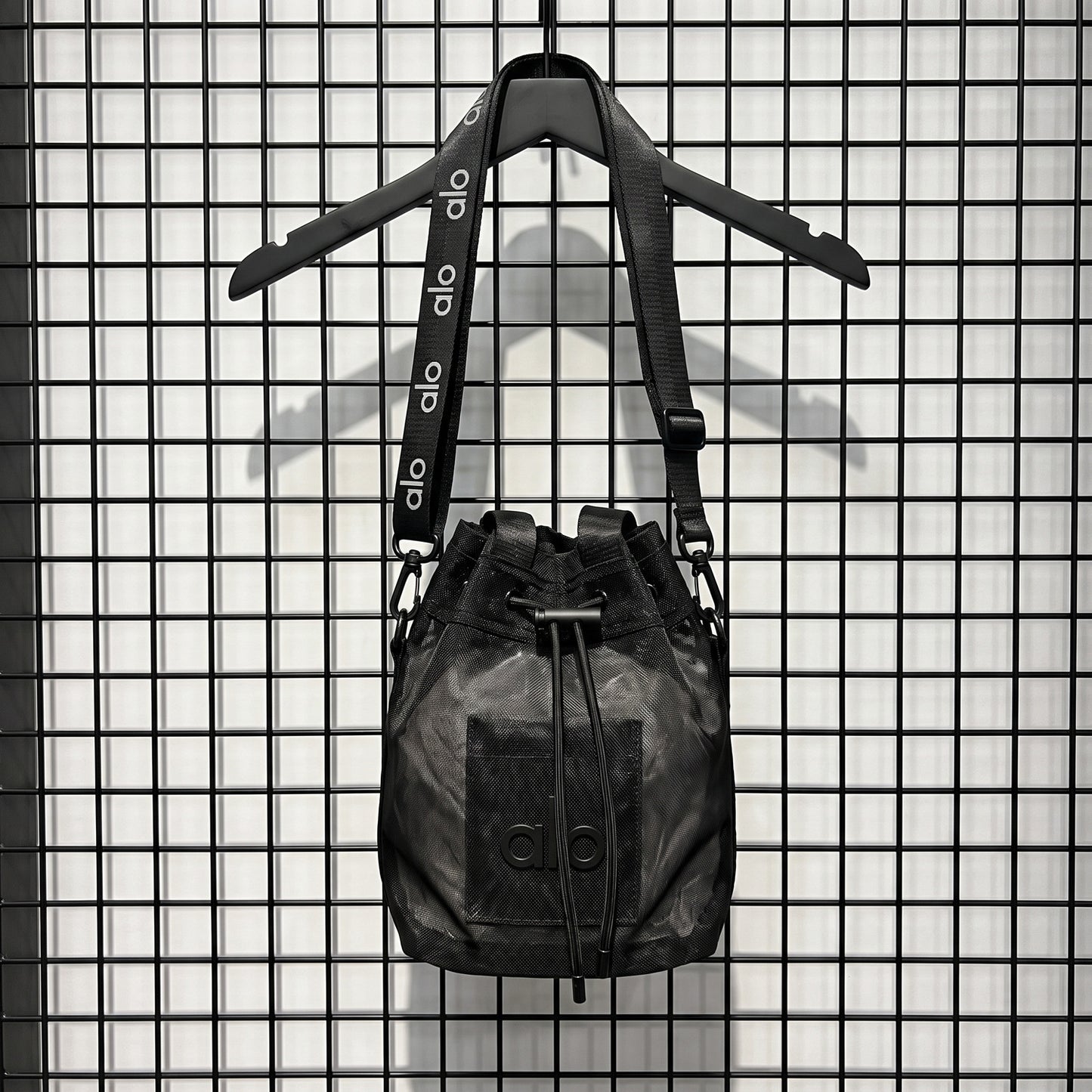 Nylon mesh drawstring bucket bag in black