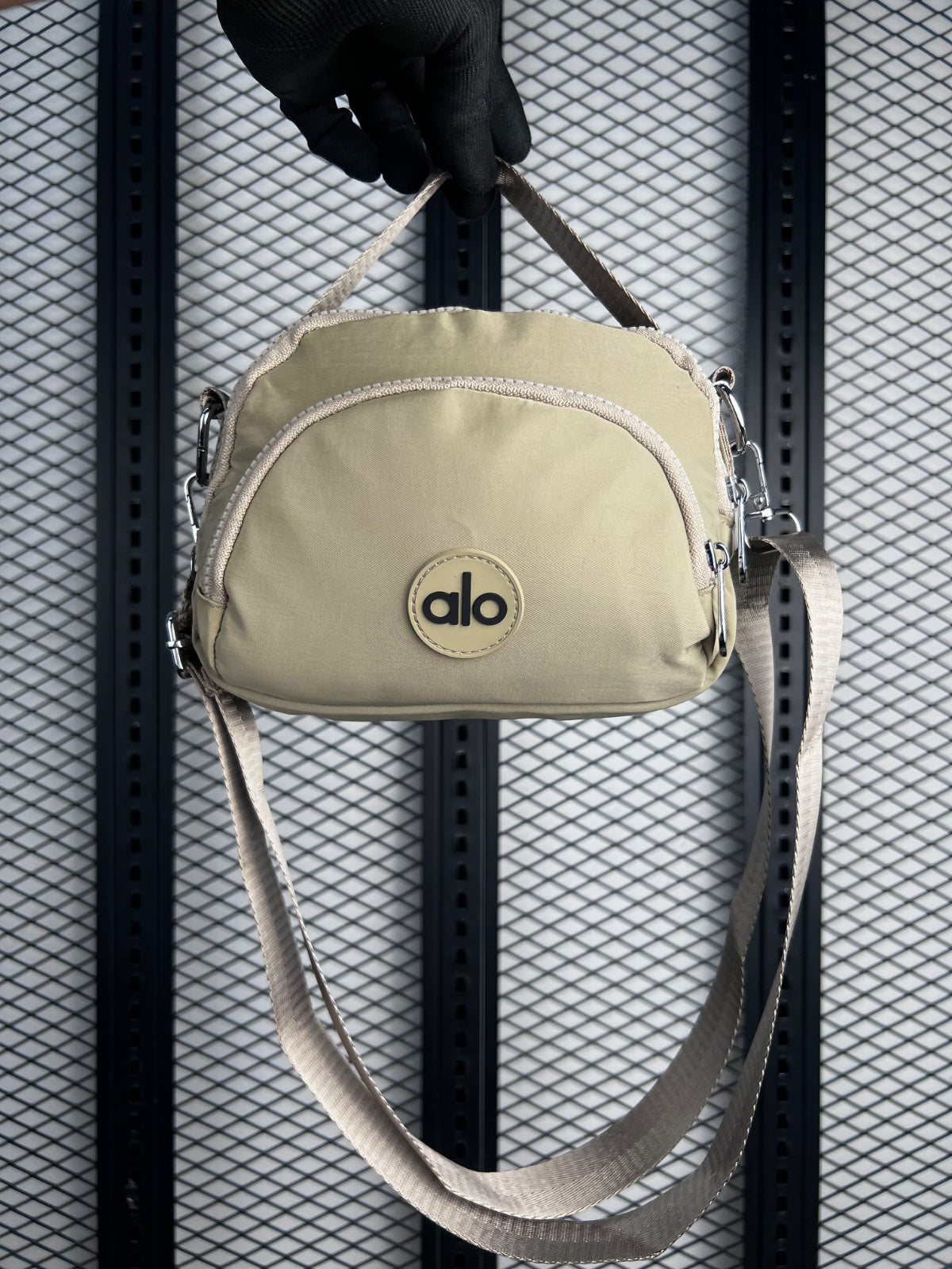 Rubberised badge nylon crossbody bag in taupe