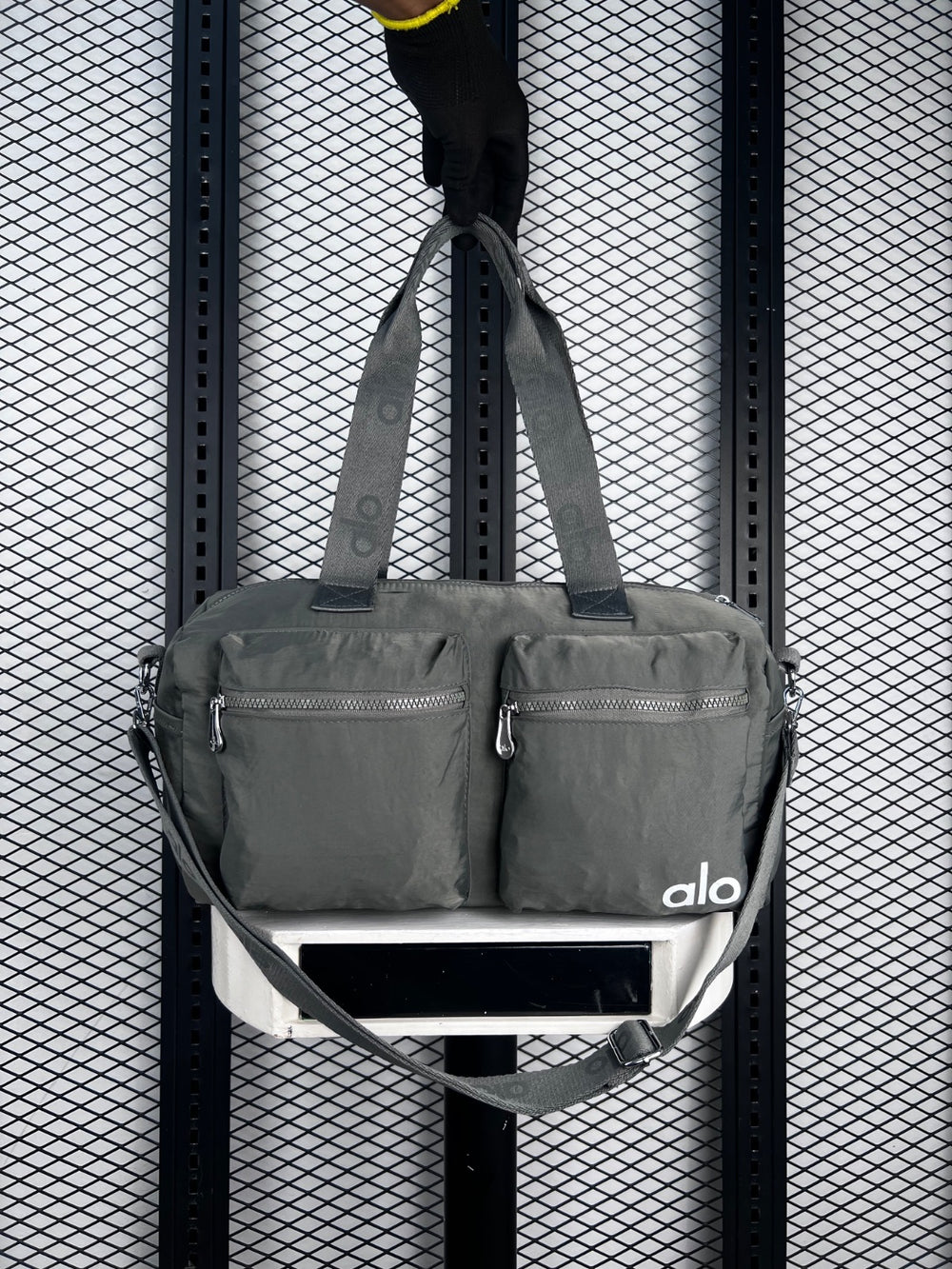 Dual-pocket crinkled nylon duffle in sage green