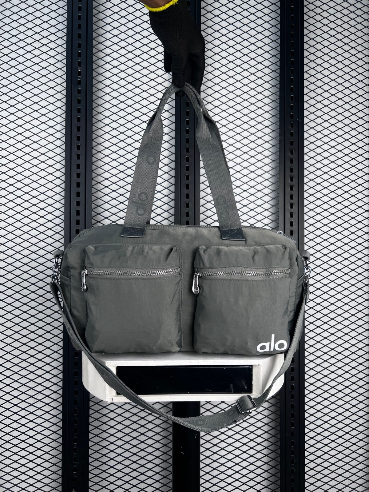 Dual-pocket crinkled nylon duffle in sage green