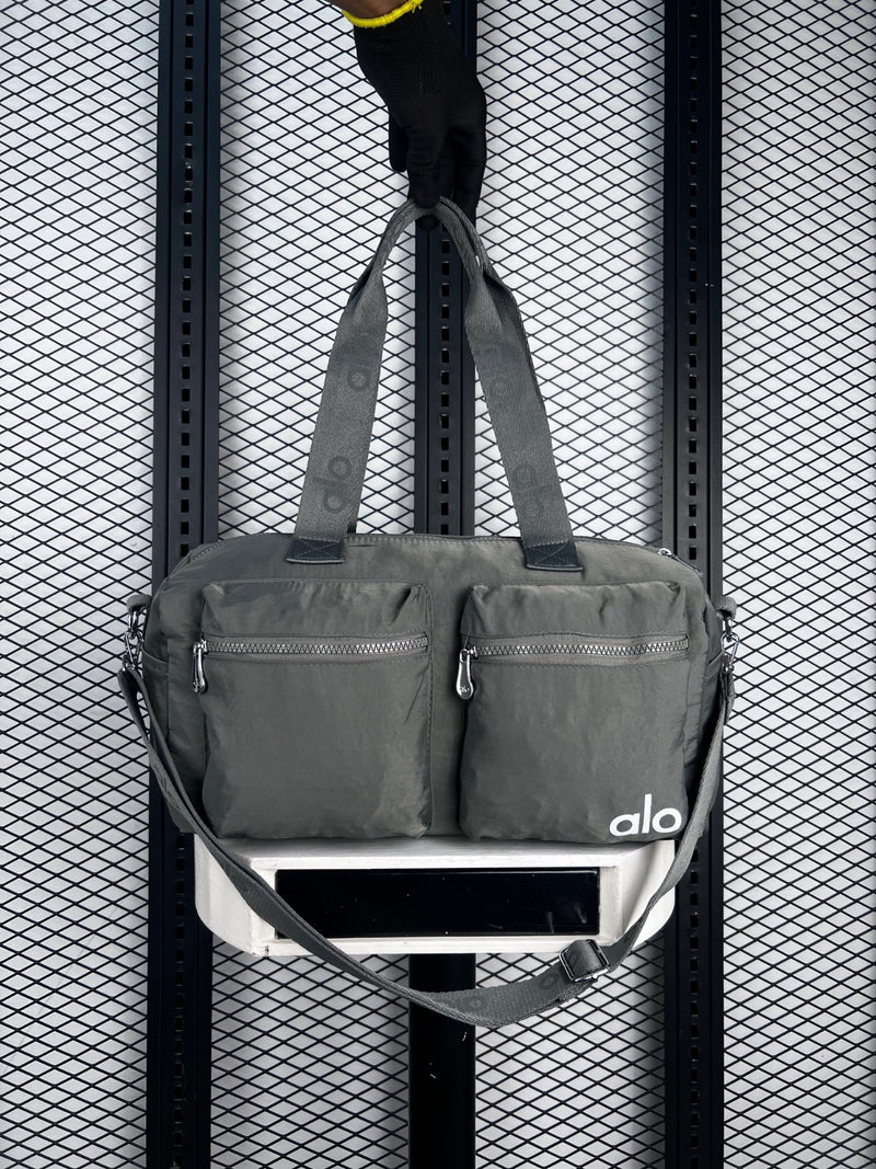 Dual-pocket crinkled nylon duffle in sage green