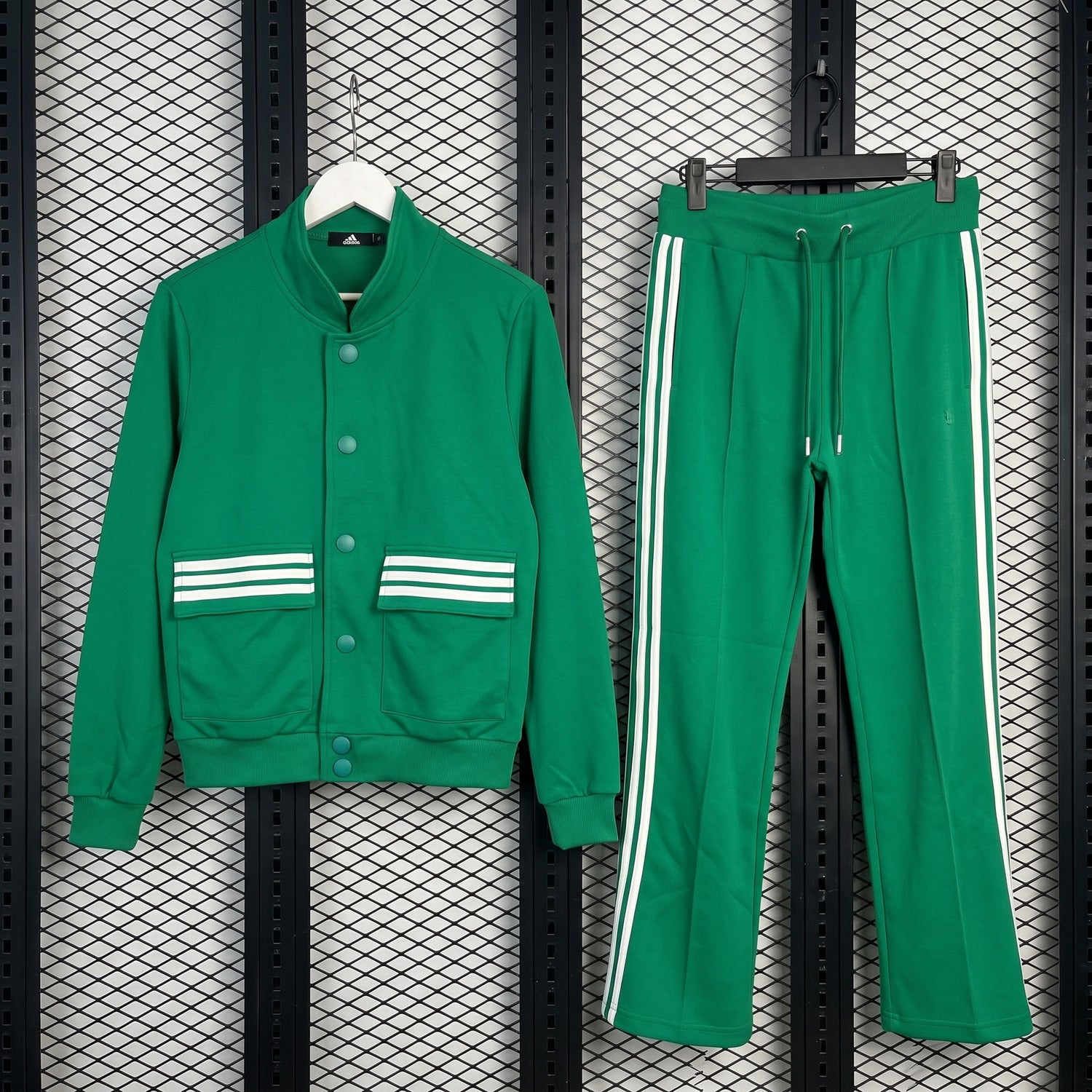 Three-stripe green track jacket and flared pant set