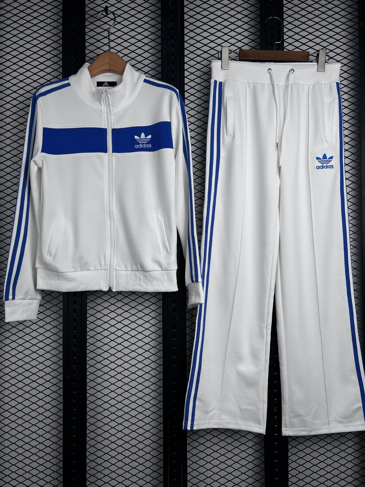 Tracksuit silhouette with blue chest panel and side stripes
