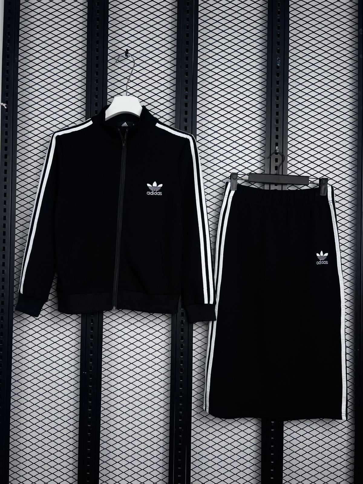 Tracksuit silhouette in black with white side striping
