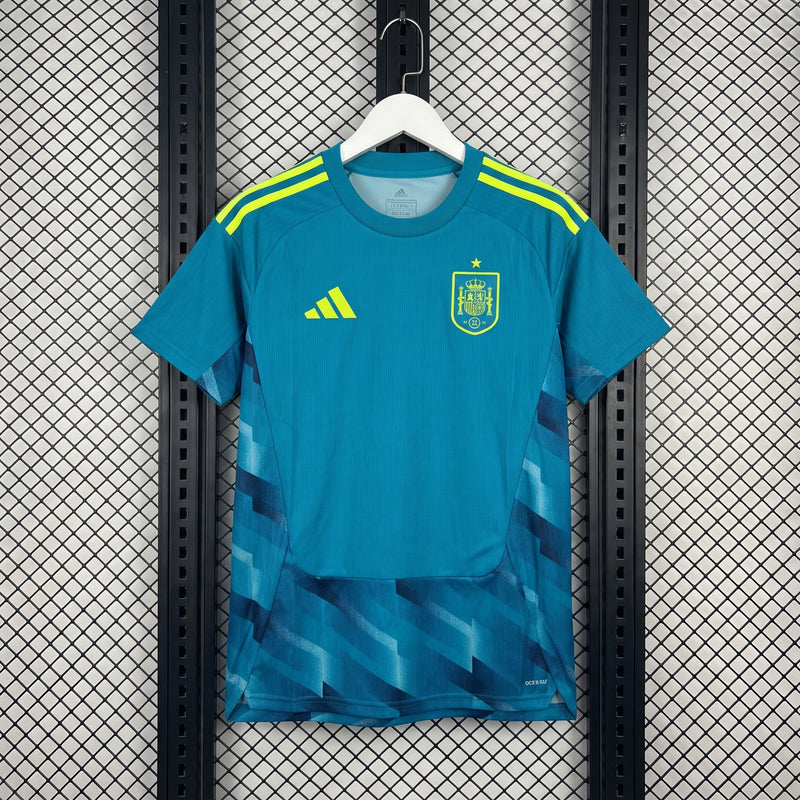 Short-sleeve training top in turquoise with geometric hem