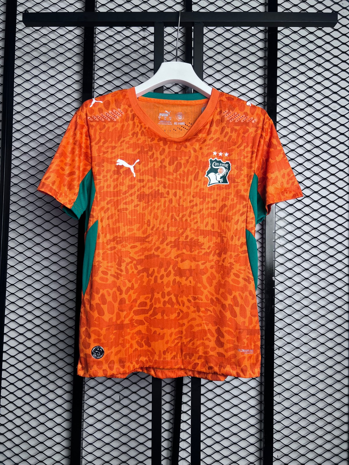 Animal-jacquard textured jersey with green shoulder accents
