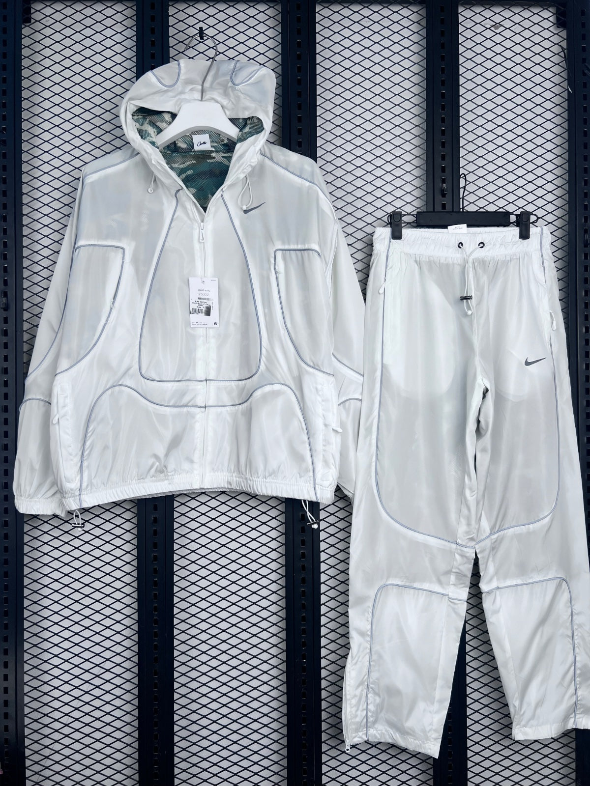 Nylon hooded tracksuit set with curved contrast piping