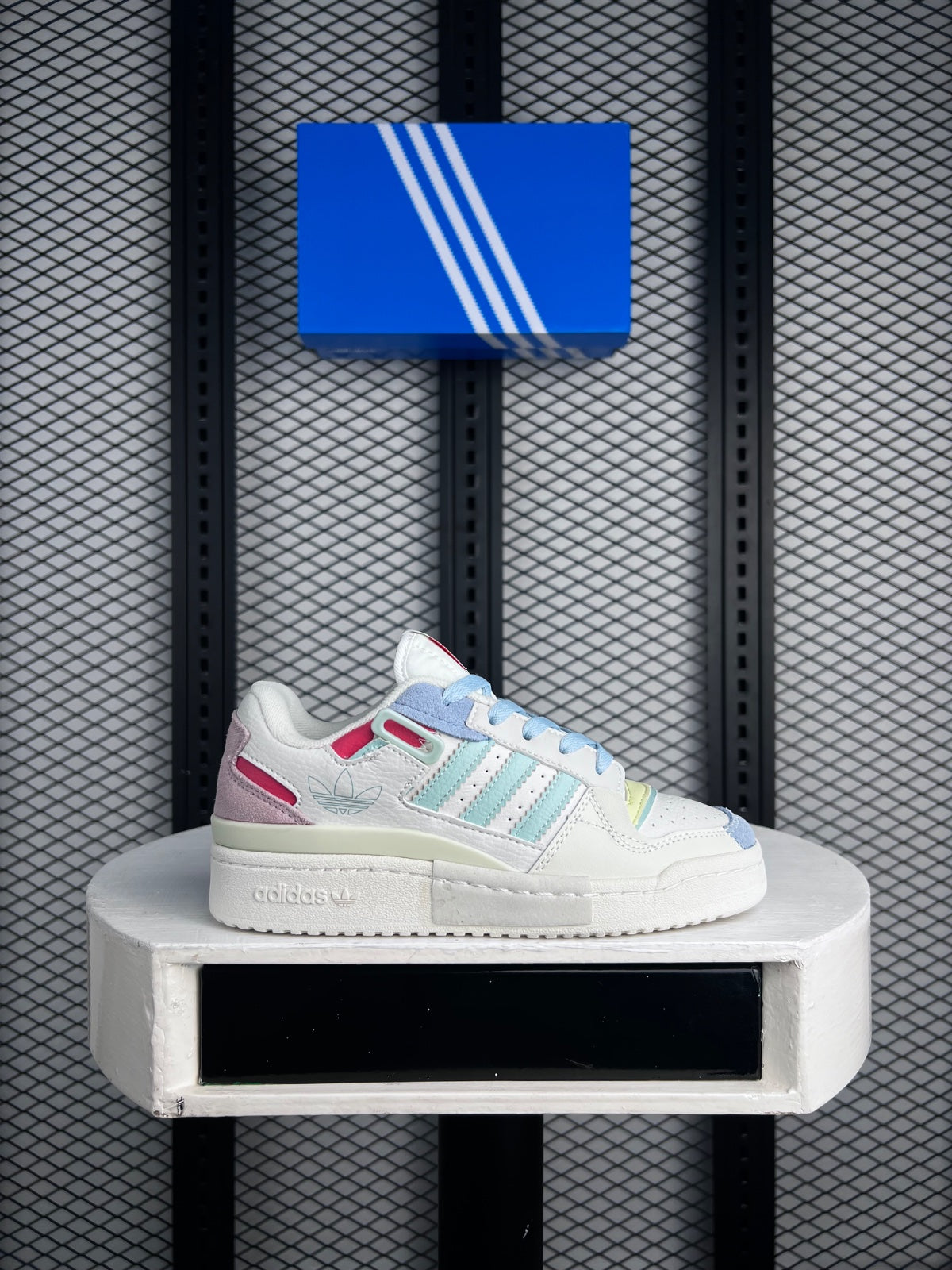 Layered leather low-top trainer with pastel panels