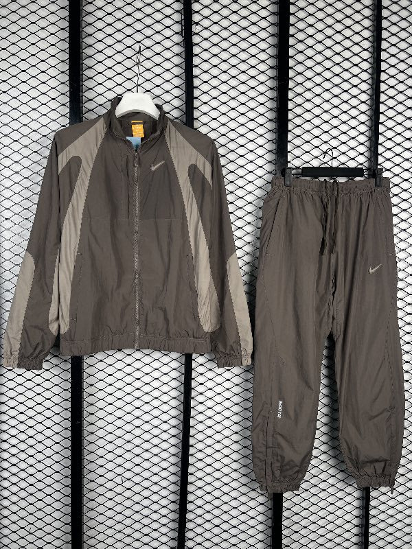 Crinkled nylon tracksuit with curved contrast panels