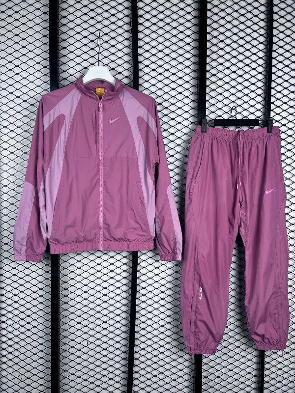 X Northstar Nylon Tracksuit in the Desert Berry pink colorway