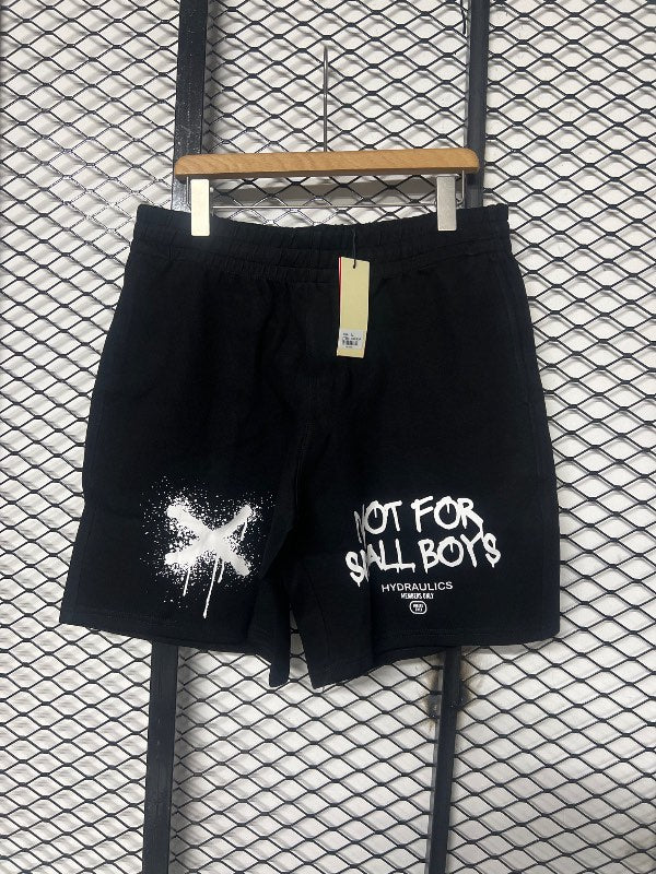 Spray-paint graphic sweat shorts in black