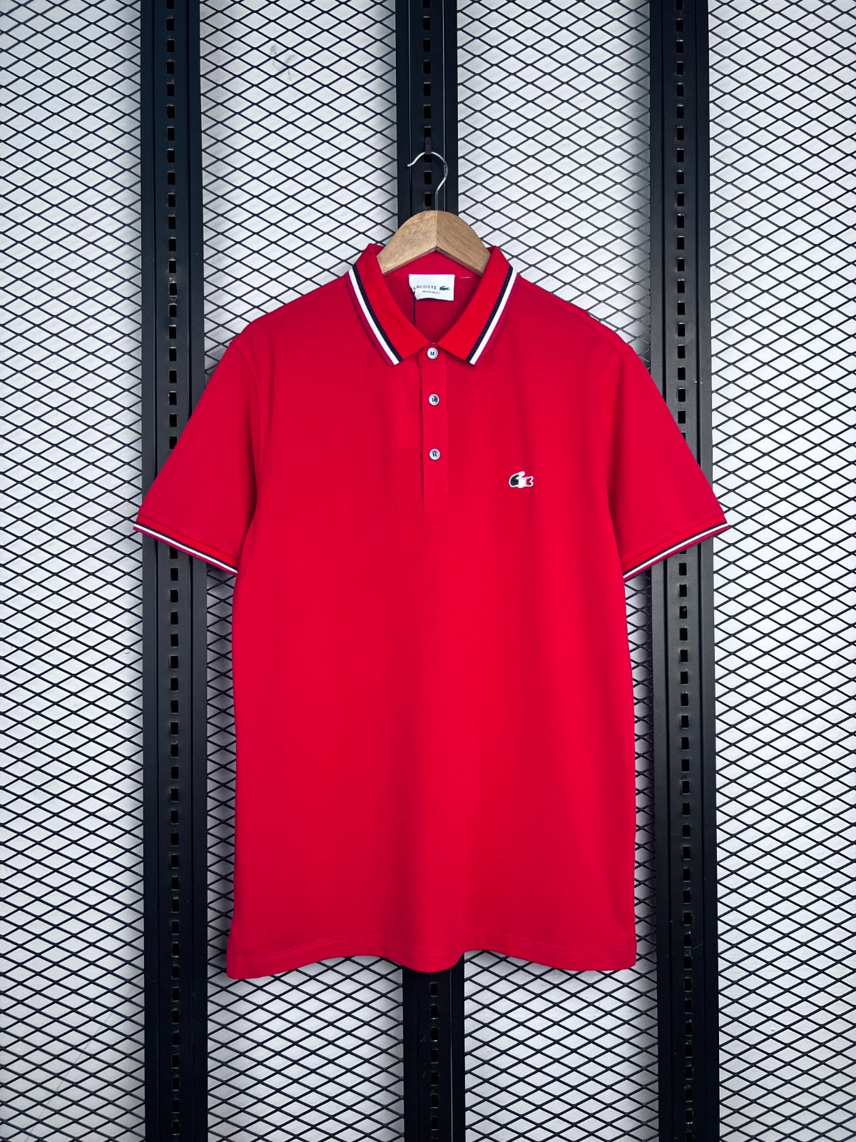 Red pique polo shirt with striped collar trim