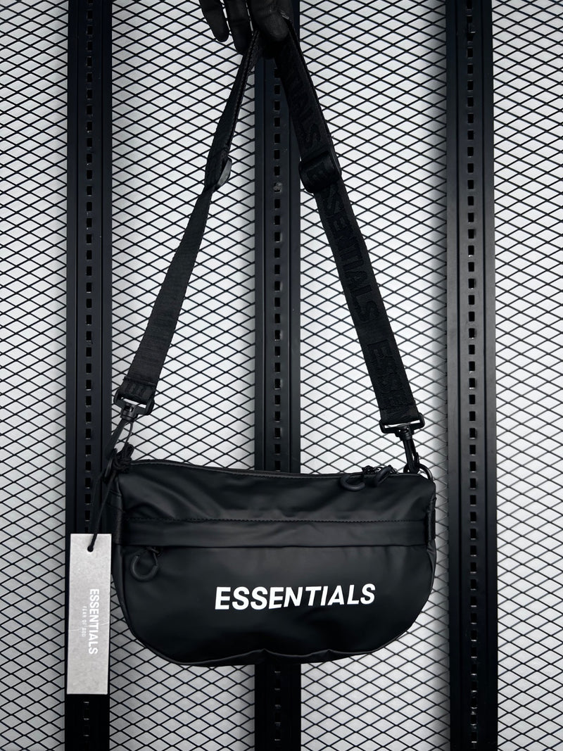 Curved semi-oval sling bag in coated black