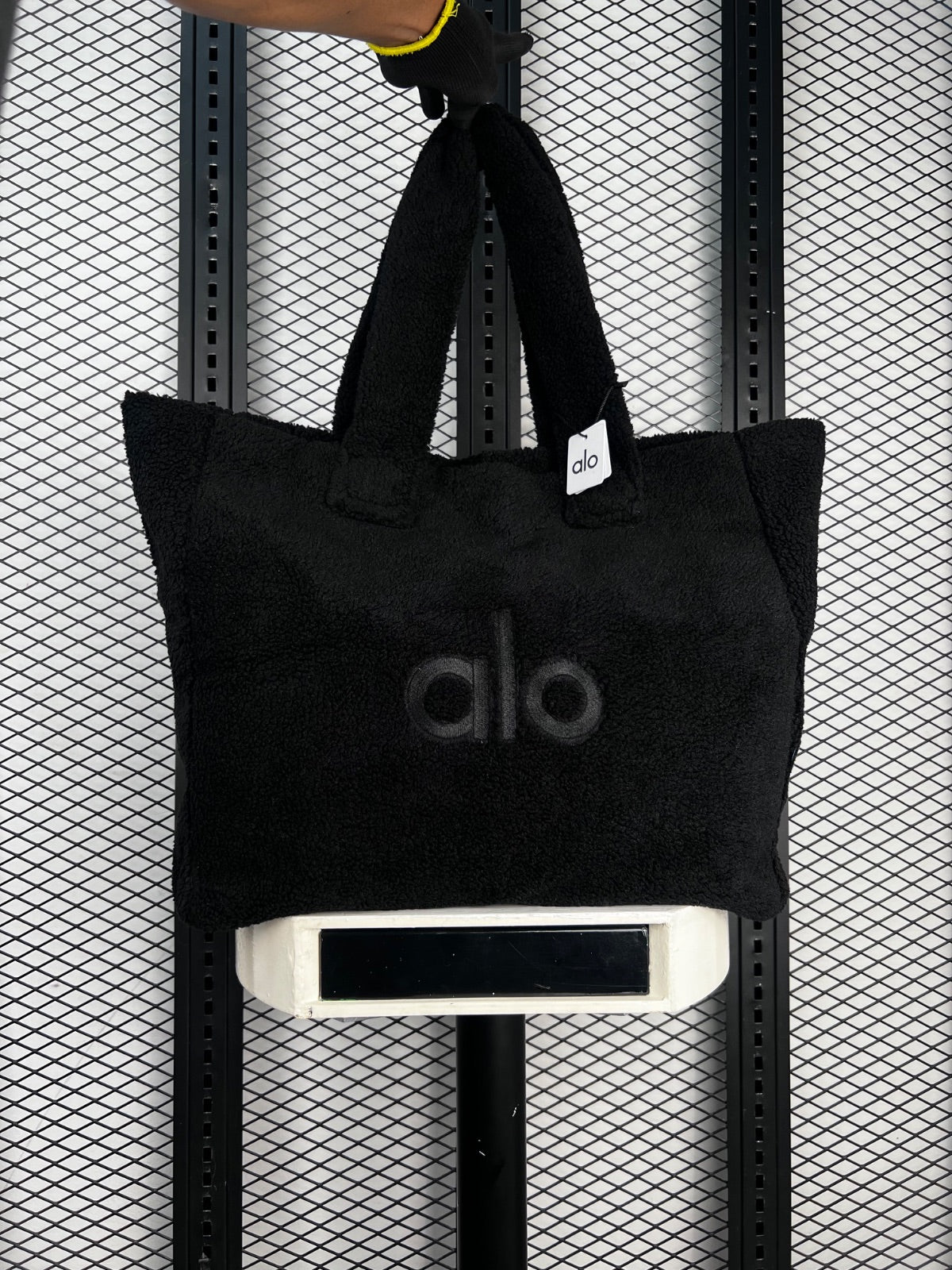 Black textured fleece tote with matching shoulder straps