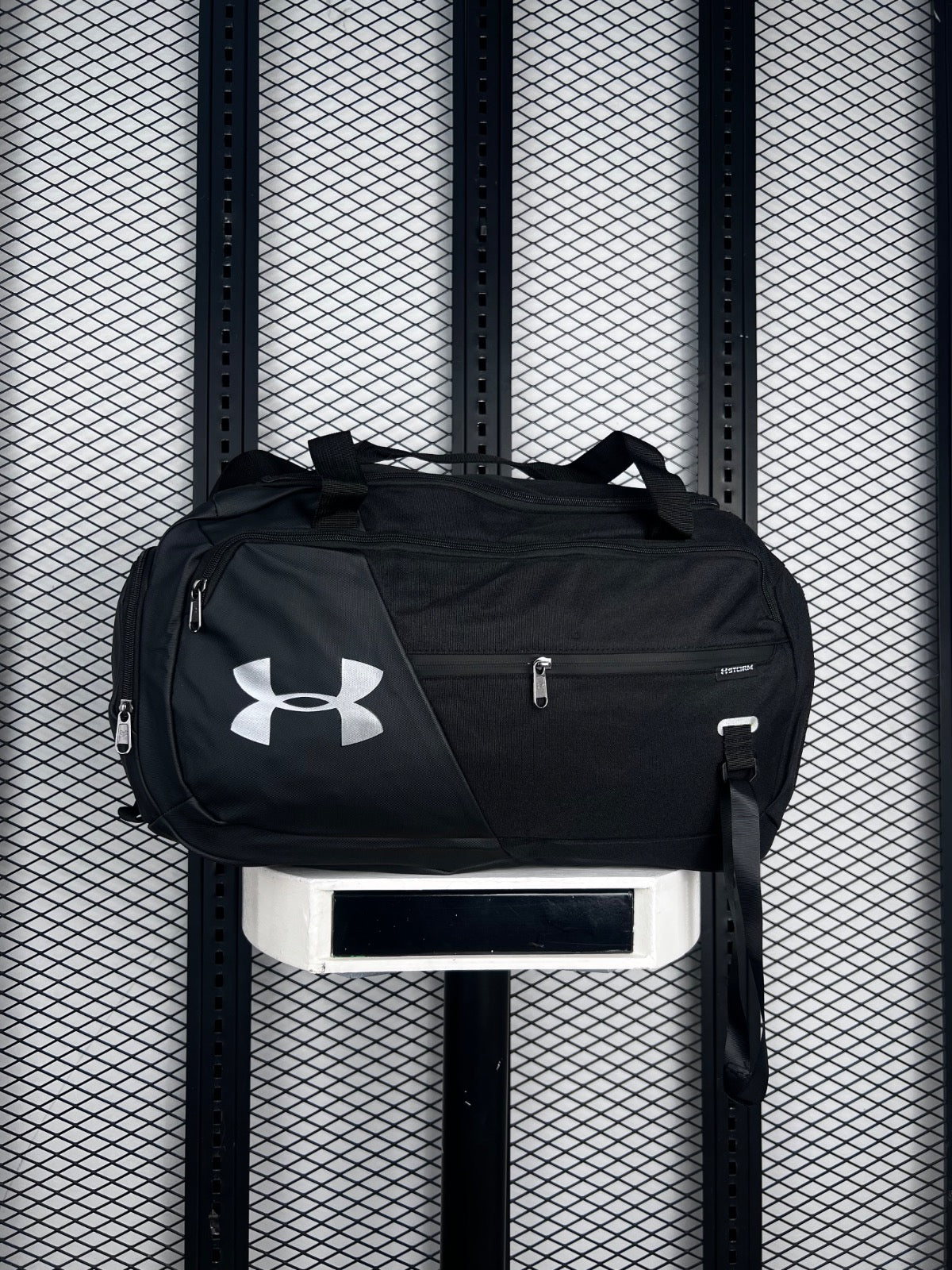 Asymmetric panel gym duffel with silver emblem
