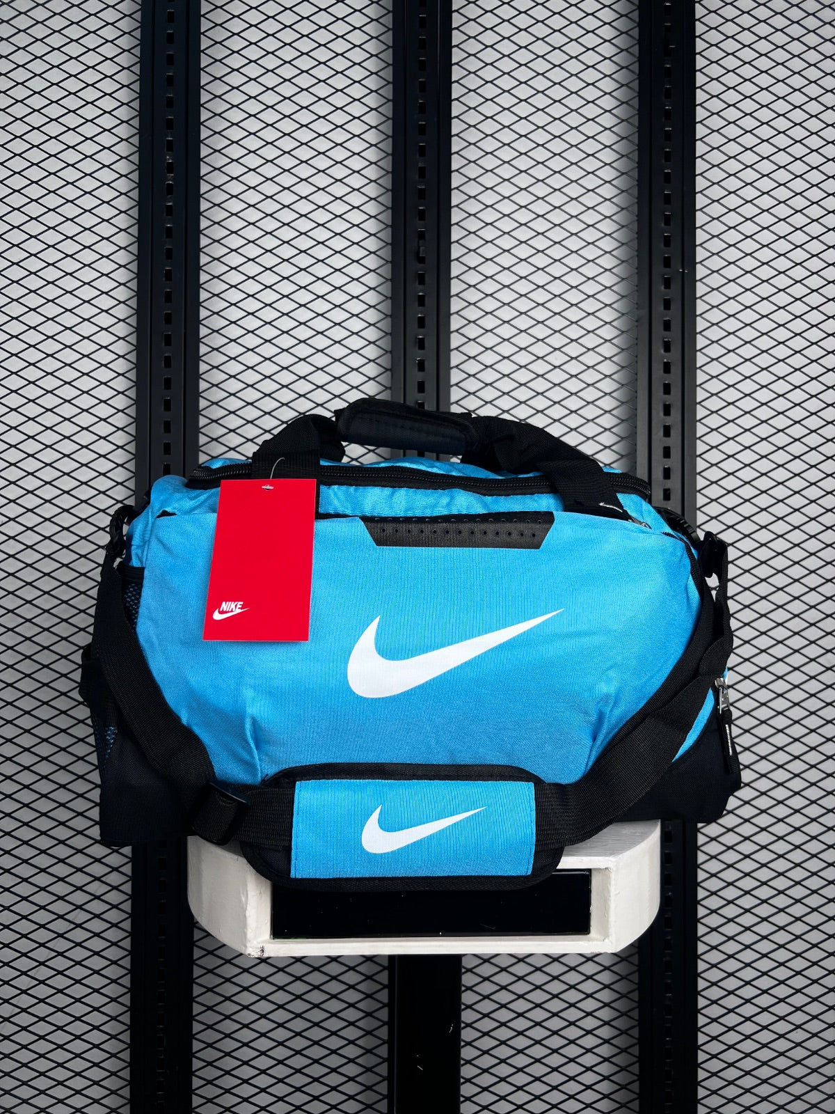 Matte-finish light blue duffel with black base panel