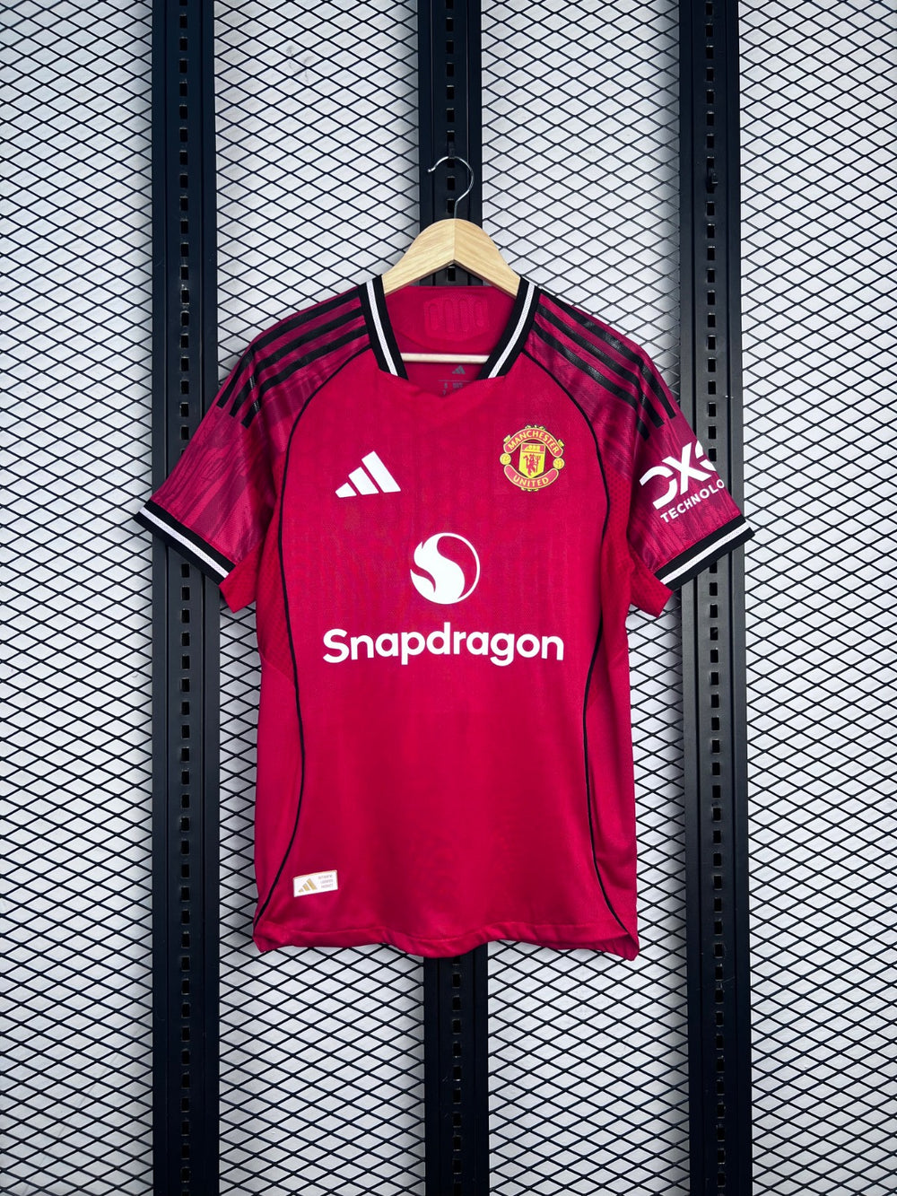 Red short-sleeve football jersey with contrast collar trim