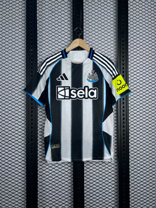 Black and white striped jersey with blue piping